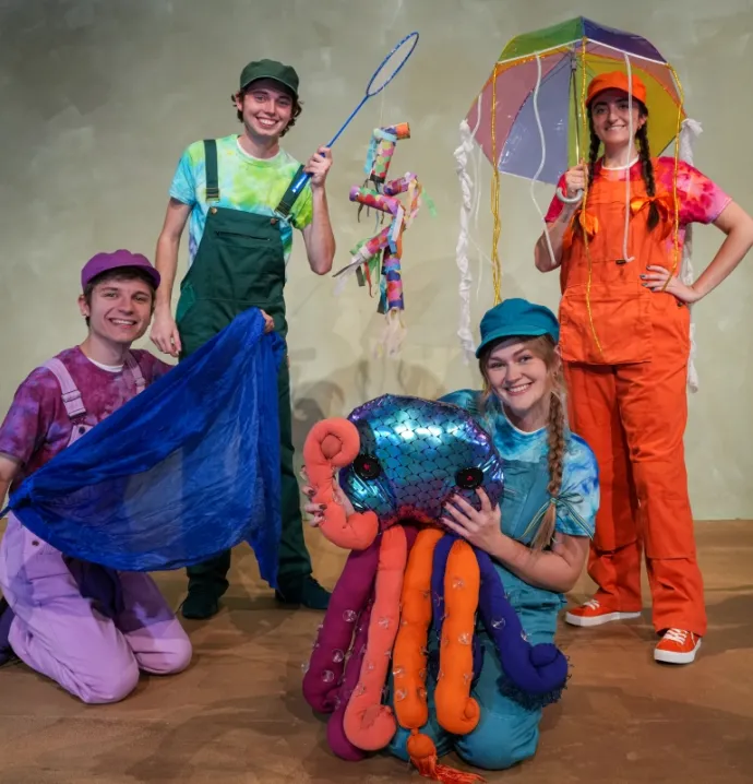 Actors dressed in costumes for "POPPED!"