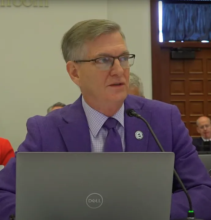 Mark Nook delivering remarks at Board of Regents meeting