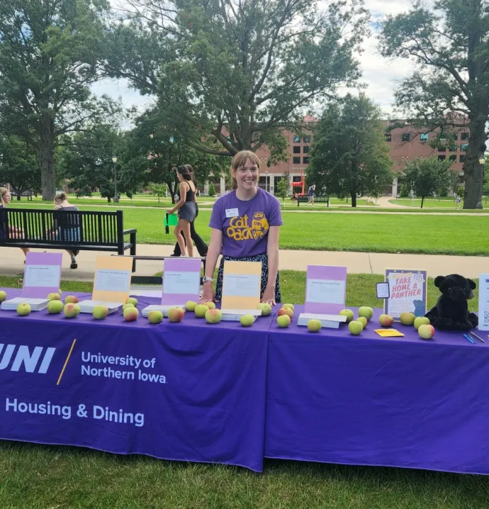 Stacey Runde tabling outside for UNI Housing & Dining