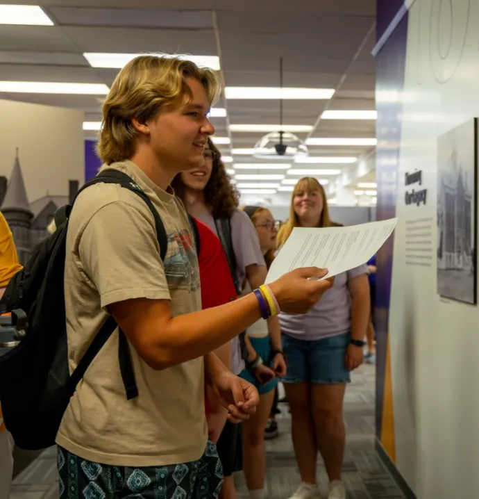 Students walk through Sesquicentennial Exhibit