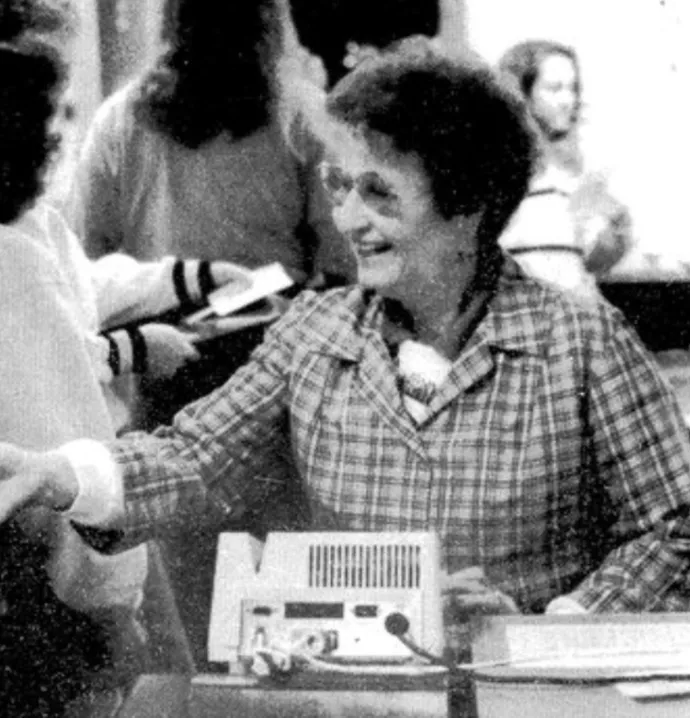 Irene Blum shown at her station in the dining center