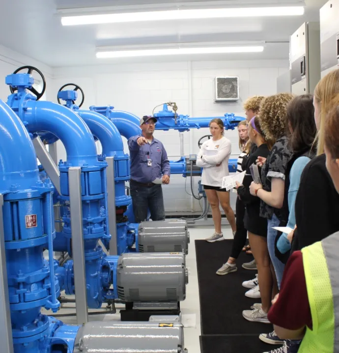 Students inside water treatment facility