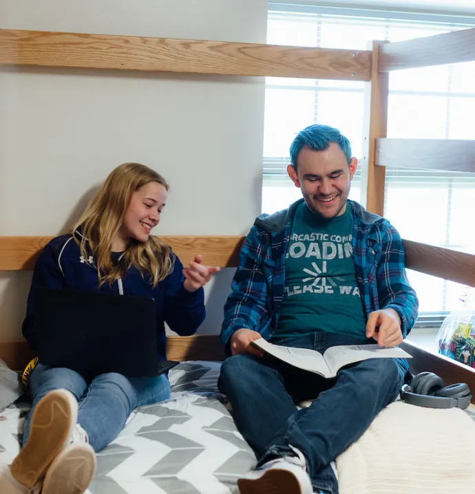 Students studying in a dorm room
