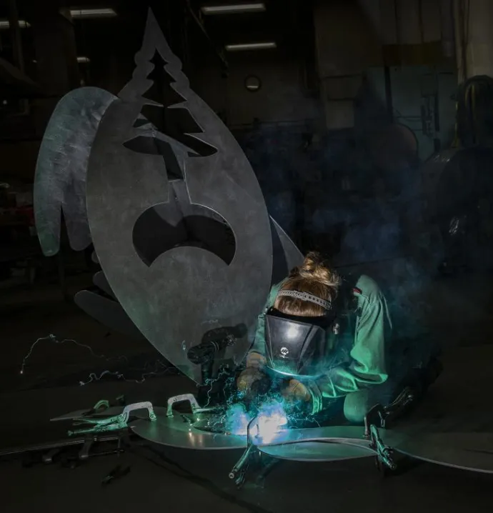 A University of Northern Iowa student welds a sculpture at the Public Art Incubator.