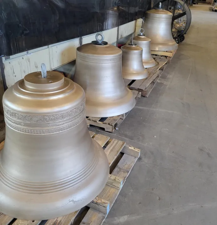 Carillon bells on wooden palettes