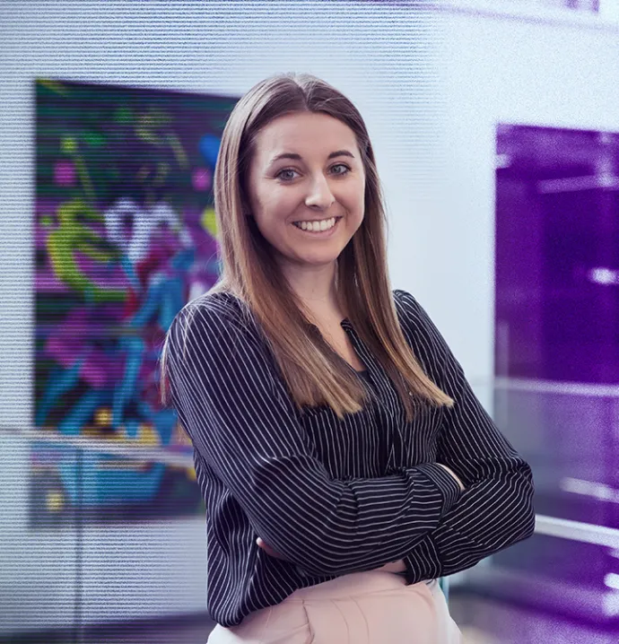 Young woman standing if office