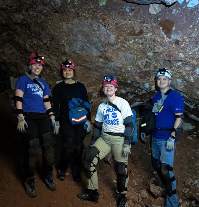 Chemistry students in a cave