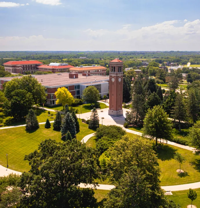 Wide drone shot of the UNI Campanile during summer