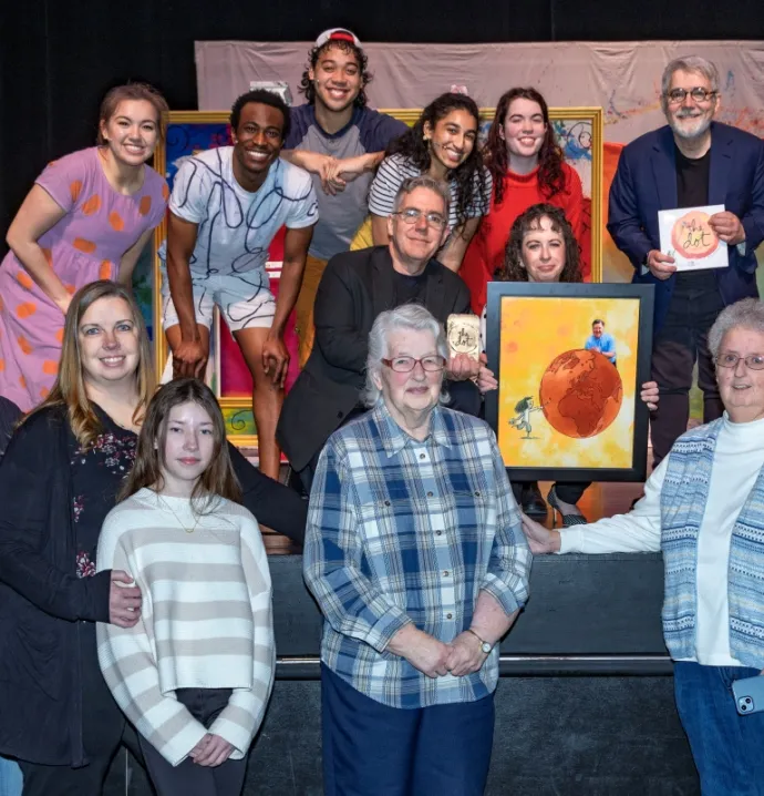 Ellen Shay with her husband&#039;s award alongside family, Peter H. Reynolds and actors from &quot;Dot Dot Dot: A New Musical.&quot;