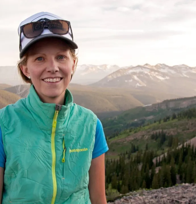 Hannah Lang with the mountains behind her