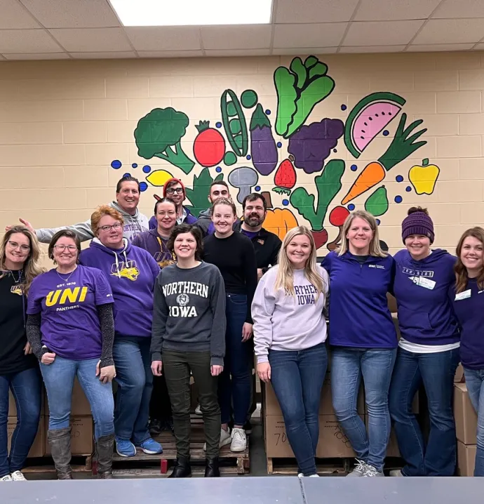 UNI staff members pack and organize donations for Northeast Iowa Food Bank