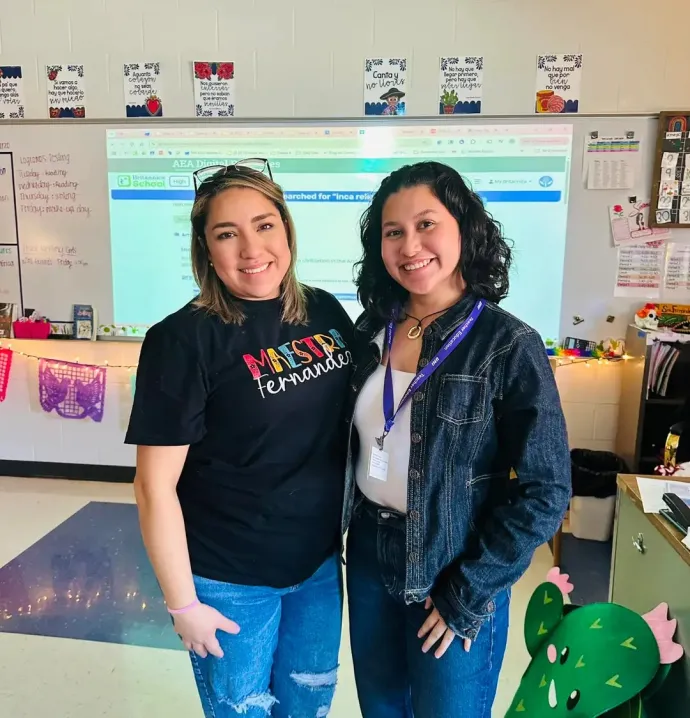 Citlaly Fernandez and Naylea Verdinez in a classroom