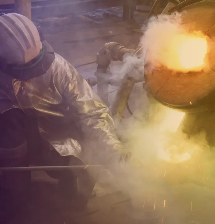 Nate Bryant doing metal casting. 