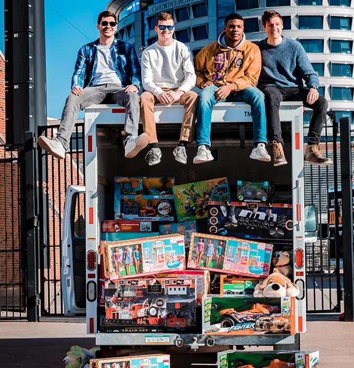 Iowa Chill founders sit atop Uhaul trailer