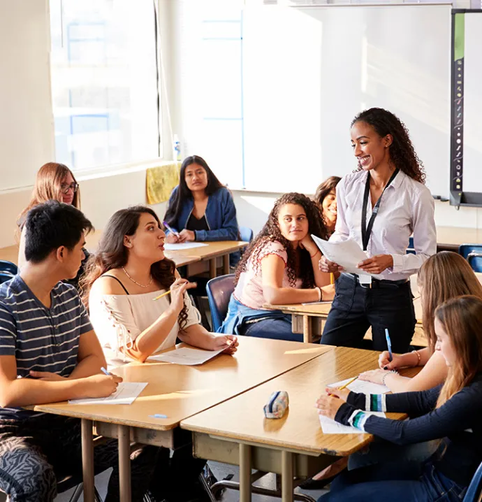 Students learning about financial literacy in classroom