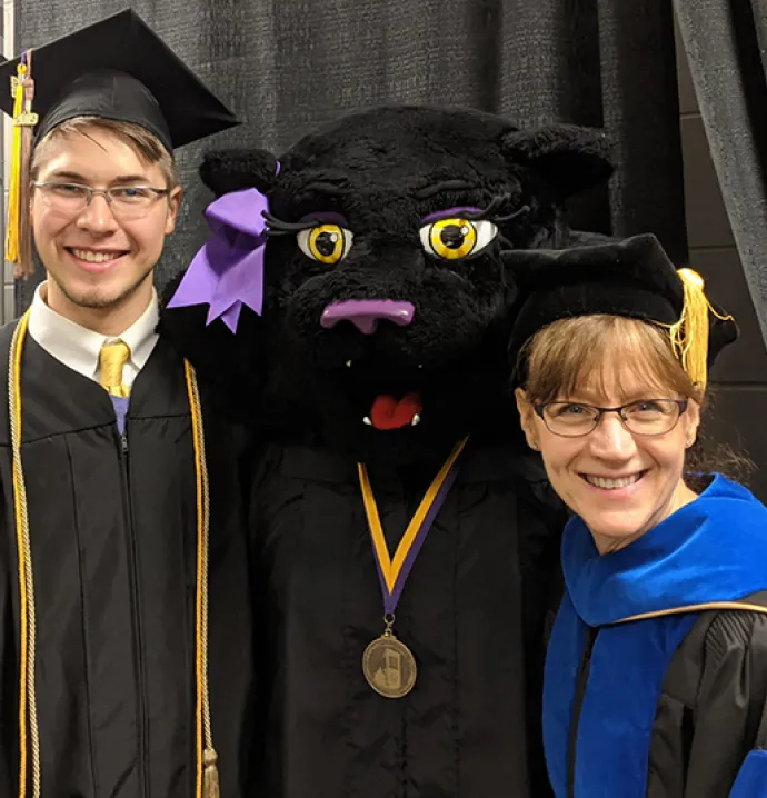 jacob smith, TK and Dean Leslie K. Wilson pose at the 2019 University of Northern Iowa commencement
