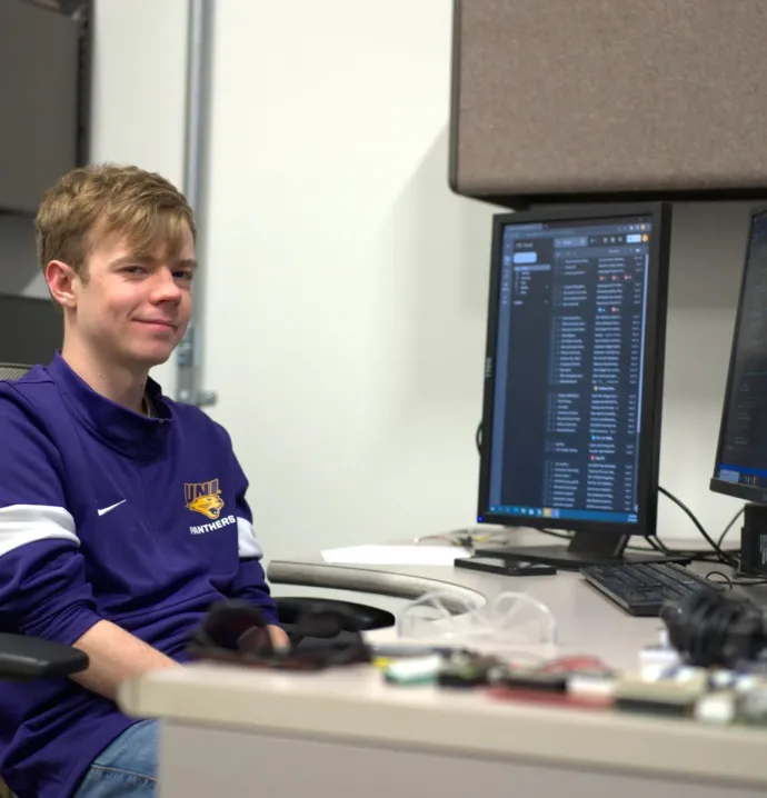 Jacob ODell with two computers