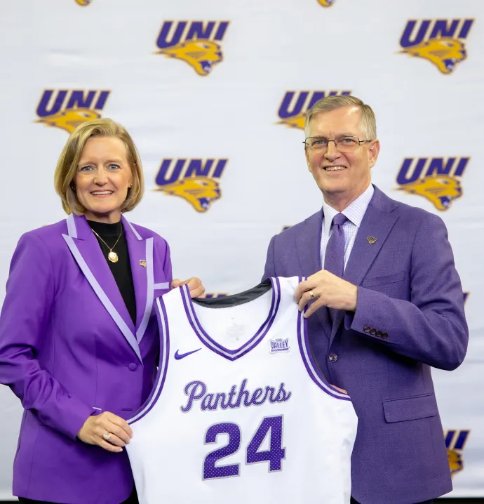New UNI Director of Athletics Megan Franklin and UNI President Mark Nook pose for a photo