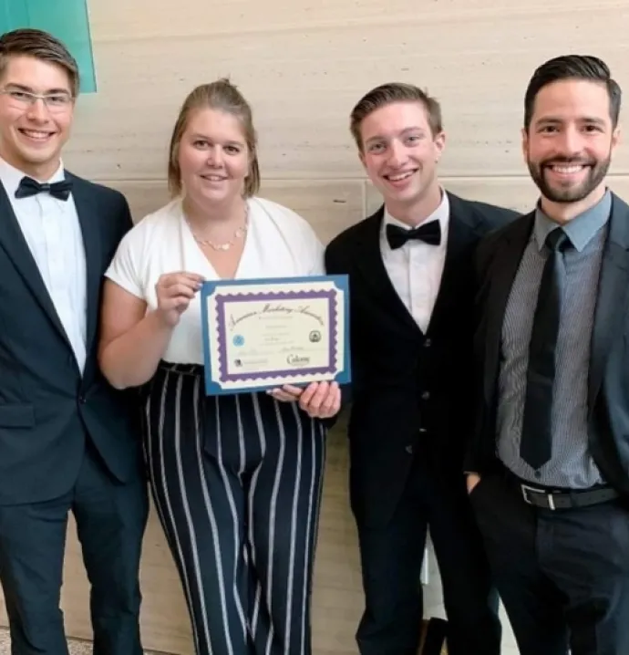 Jacob Smith, Adrian Velasco, Hannah Hoth, and Andrew Jeffrey win first place at the annual Marketing Strategy competition