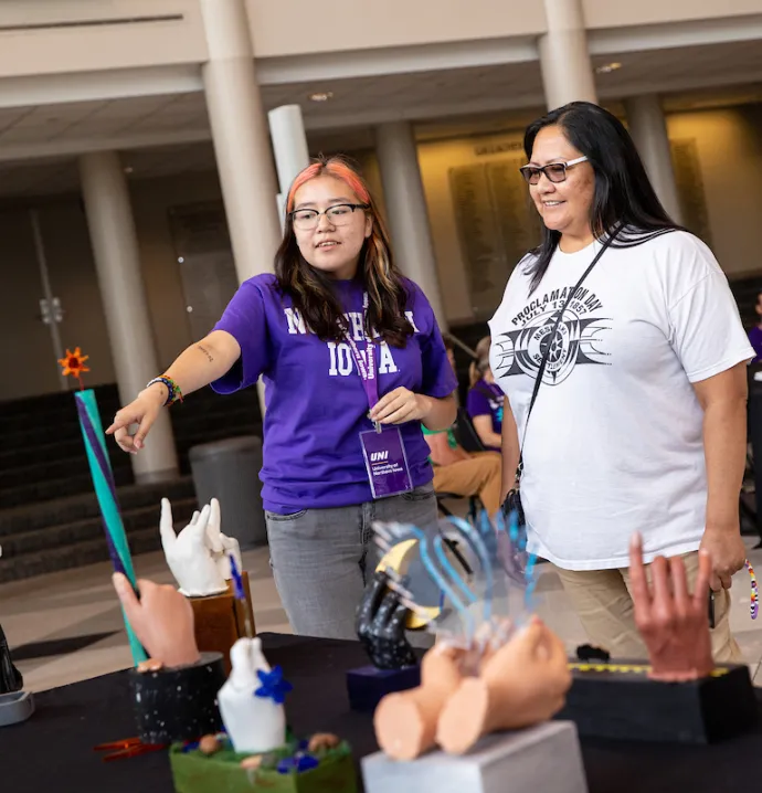 Meskwaki student shows off hand sculptures