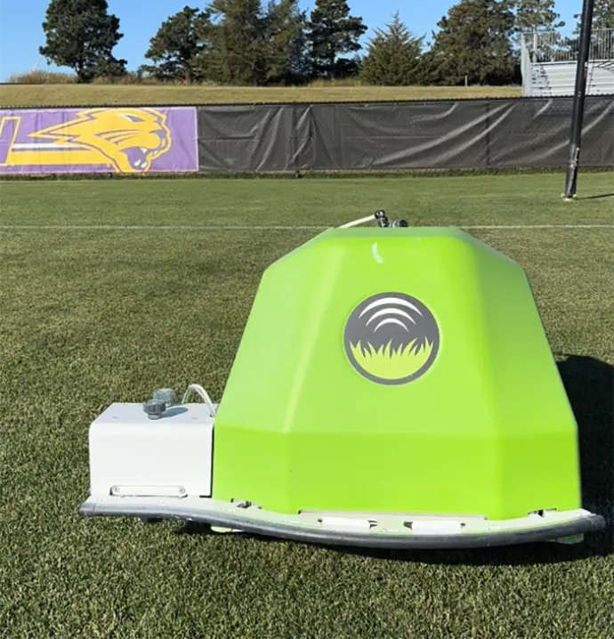 Paint robot featured on UNI soccer field. 