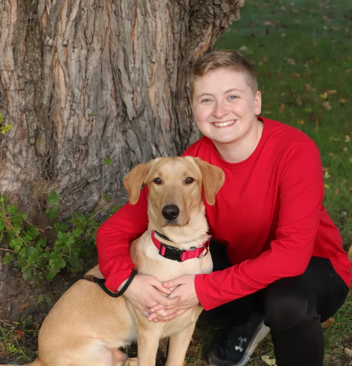 Skyler Ramsey with service dog
