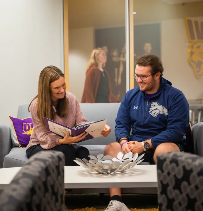UNI student talking with advisor