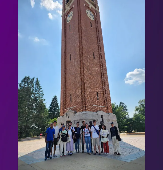 Students from University of Yamanashi standing in front of the Campanile
