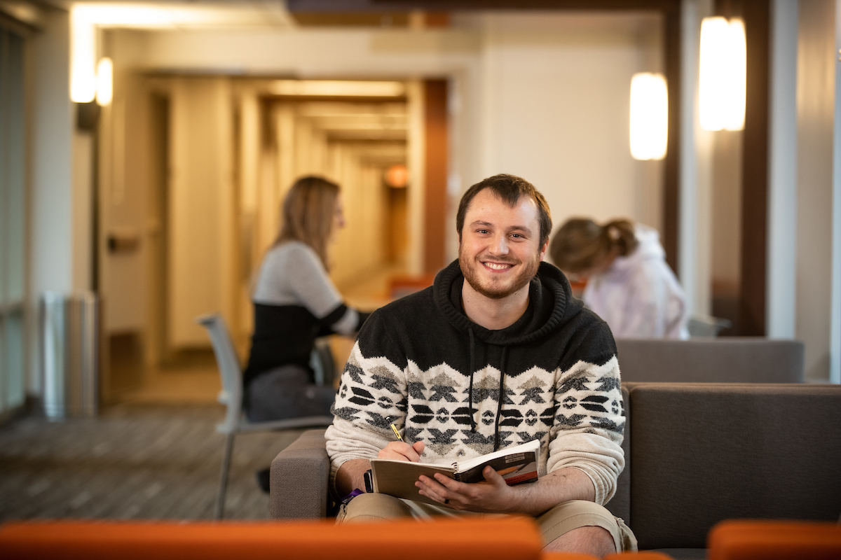 Student studying textbook